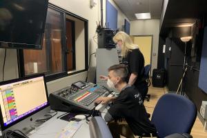 MBA students working on sound mixing for wind ensemble performance