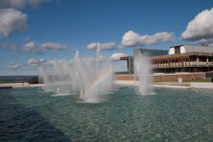 A rainbow in the Ithaca College fountain