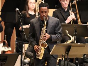 Student playing a saxophone