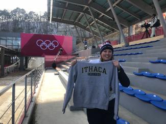 Kristen Gowdy shows her IC sweatshirt at the PyeongChang Olympics.