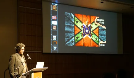 A man standing at a podium on stage