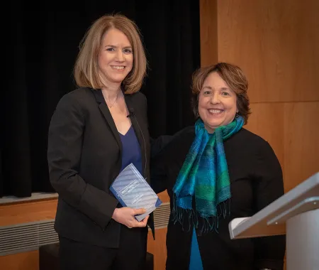 Laura Zelenko and Dean Diane Gayeski with an award
