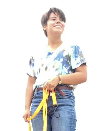 A young woman standing outside