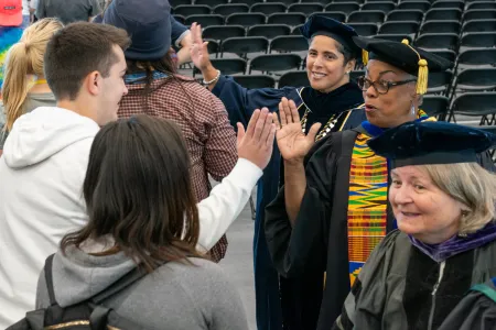 People giving high fives