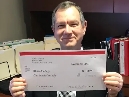 man holding a check