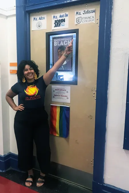 woman in front of a classroom door