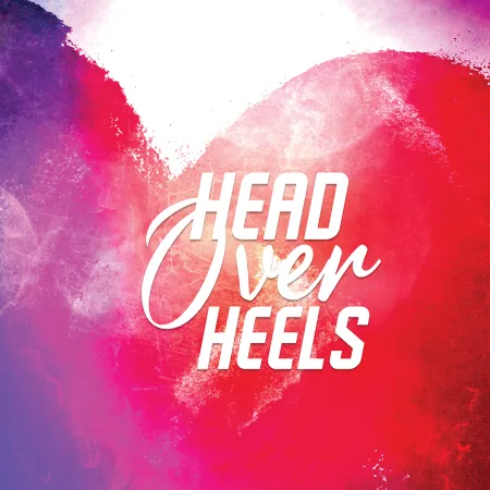 Musical title, "Head Over Heels" against background of purple and red heart.