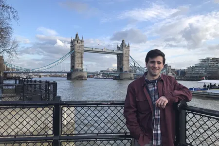 student by Tower Bridge