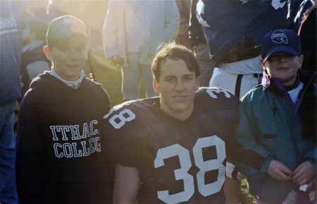 football player with two kids