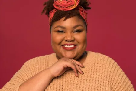 woman in a tan sweater