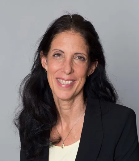 smiling woman with woman with long dark hair