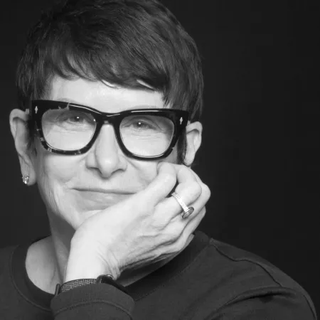 Woman with short hair wearing glasses