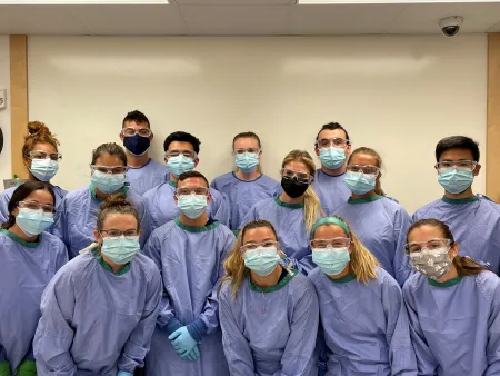 AT students in human anatomy lab