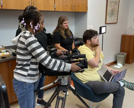 students filming