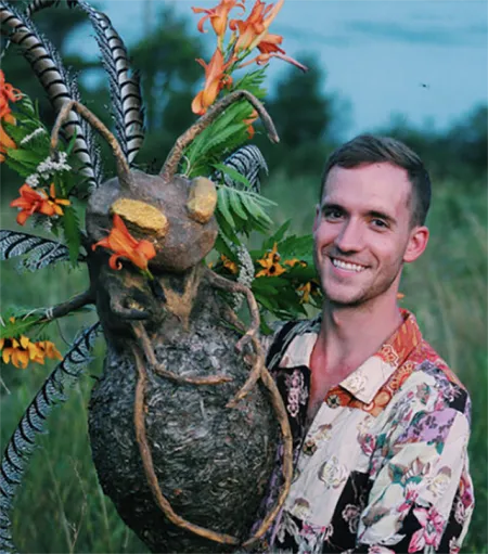 Michael Sullivan holding a mask