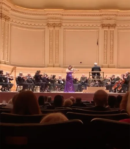 Bouey performing on stage