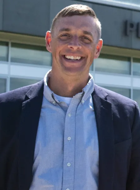 man outside building