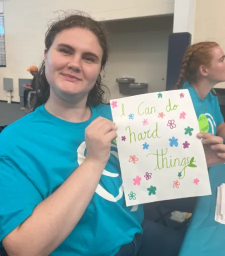 Student holding paper