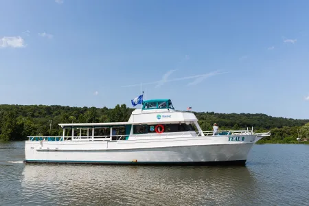 A boat cruises a lake. 