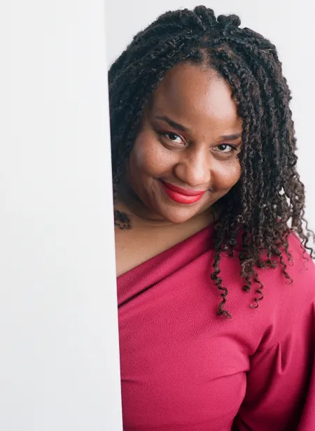 Maya in a pink shirt