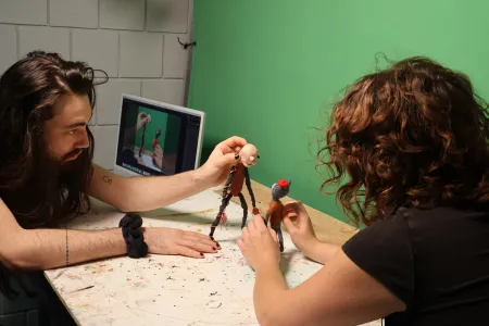 Students work on stop-motion claymation project. 