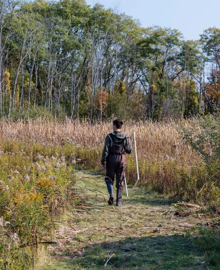 Student Exploring IC Natural Lands