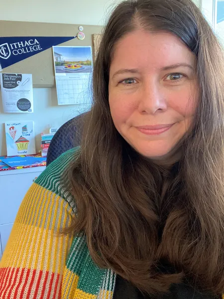 Meghan Fouracre with IC pennant in background