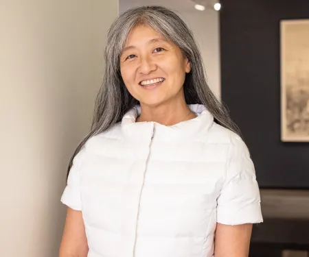 standing woman wearing white