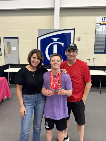 Christina Rogers ‘93 and Chad Rogers ’92 and their son, Luke.