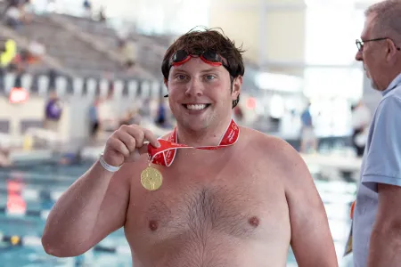 Michael Szabelski and his newly awarded gold medal.