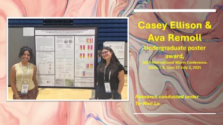 students next to award winning poster