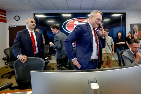 Tariq in front office with John Lynch