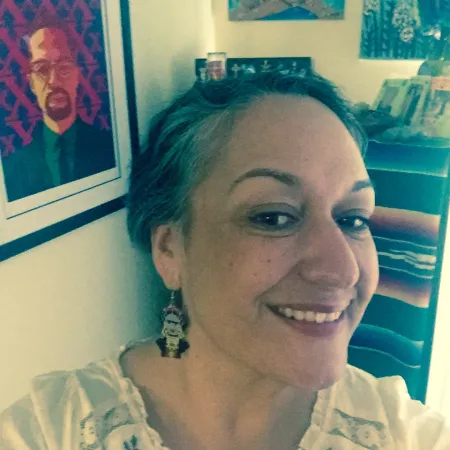 Photo of Gloria in her home