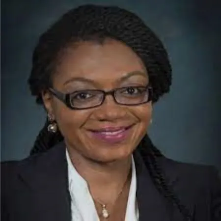 Headshot of Henrietta Awo Osei-Anto. Henrietta is wearing a black suit jacket and white shirt.