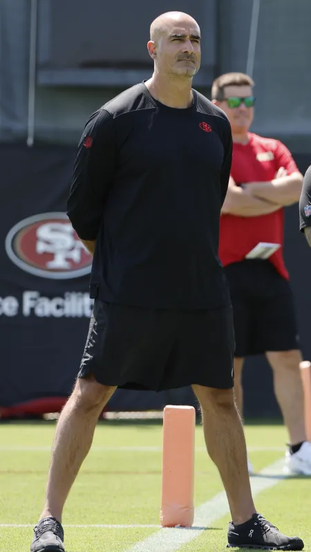 Tariq Ahmad standing on the 49ers practice field