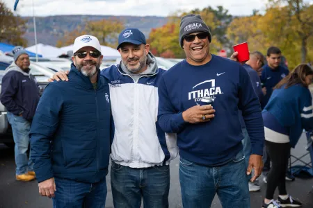 Men wearing IC gear at a tailgate.