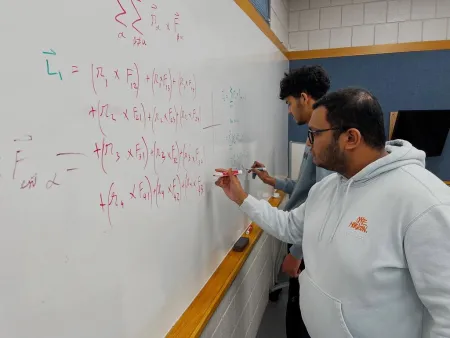 Students working on math problems.