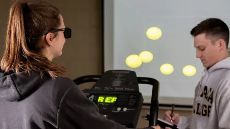 student on treadmill in a focus-based study