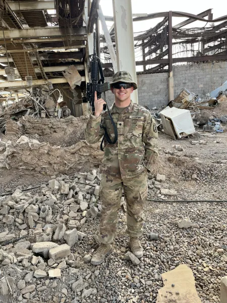 A soldier wears camo.