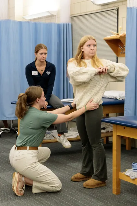 Theater students work with PT clinic students
