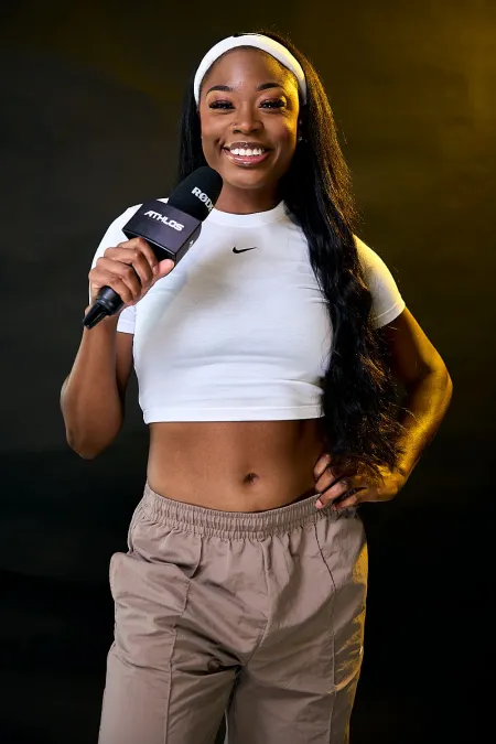 Katelyn holding a mic