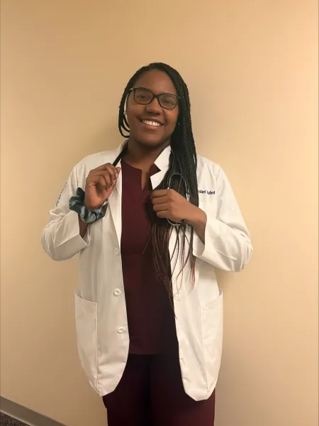 Joan at her short white coat ceremony