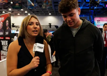 A college student interviews NFL star Cooper DeJean.