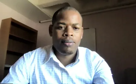 man wearing a light colored shirt