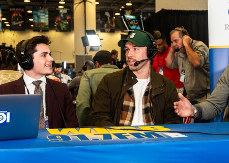 A college student interviews retired NFL star Will Compton.retired NFL star 