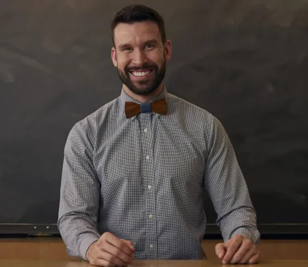 Bearded man wearing a bow tie.