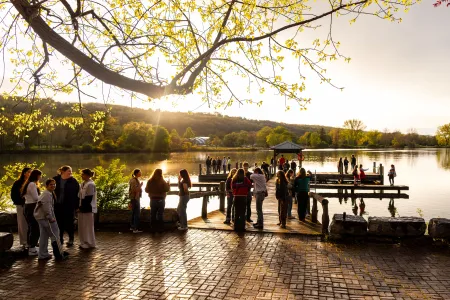 Students at a lakeside party.