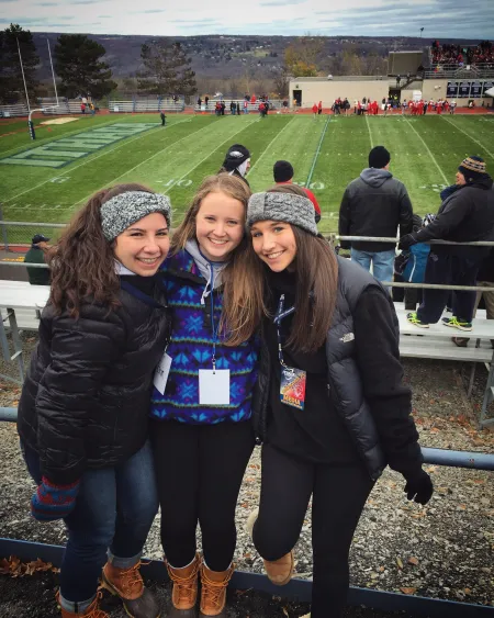 Kempner working for ICTV at Yankee Stadium at Cortaca Jug 2015 with fellow '18 Alums Jamie Reich and Mackenzie Lozano