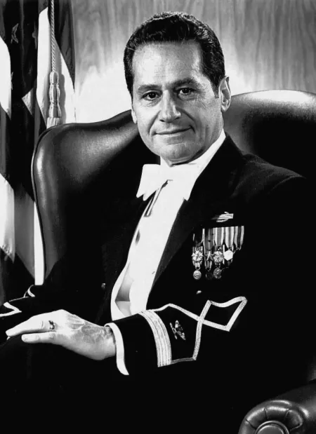 A black and white photo of a man in a military uniform.