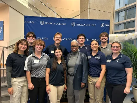 1st and 2nd year ATS posing with president Cornish